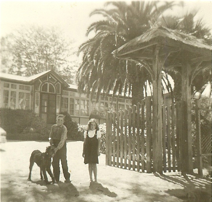 Susan, Michael and Jimmy the Airedale, in front of the Casa Patronal.