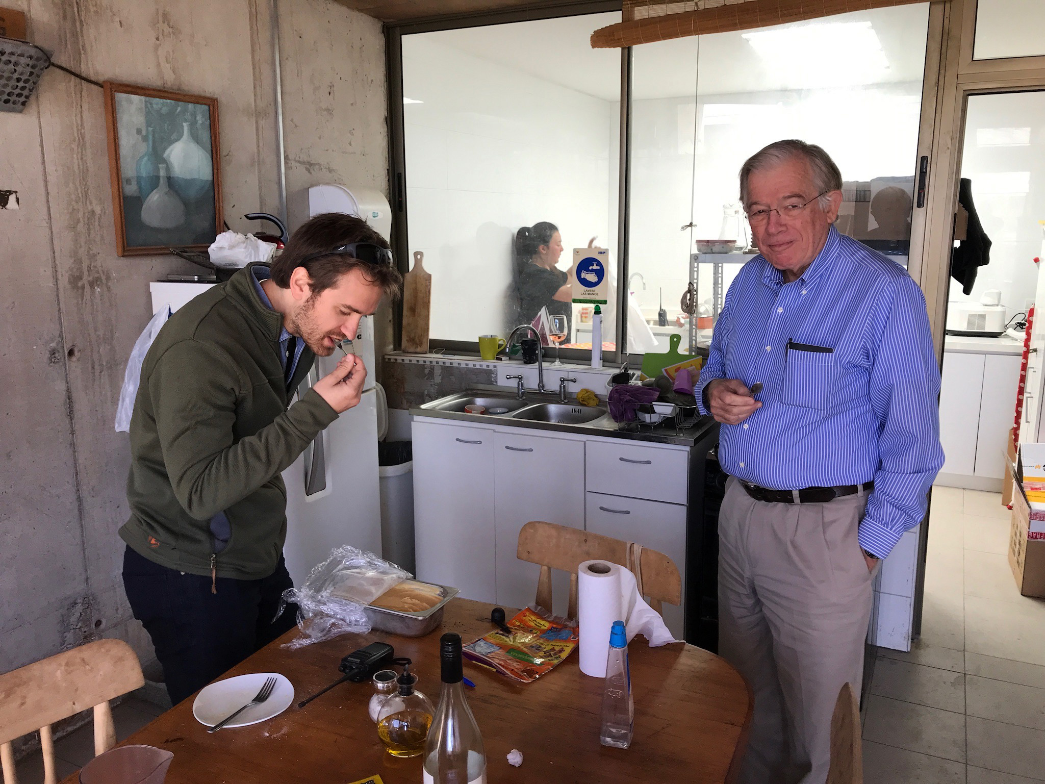 Amael and my Dad, Michael Kingston, sample homemade salted caramel ice cream in the staff kitchen.