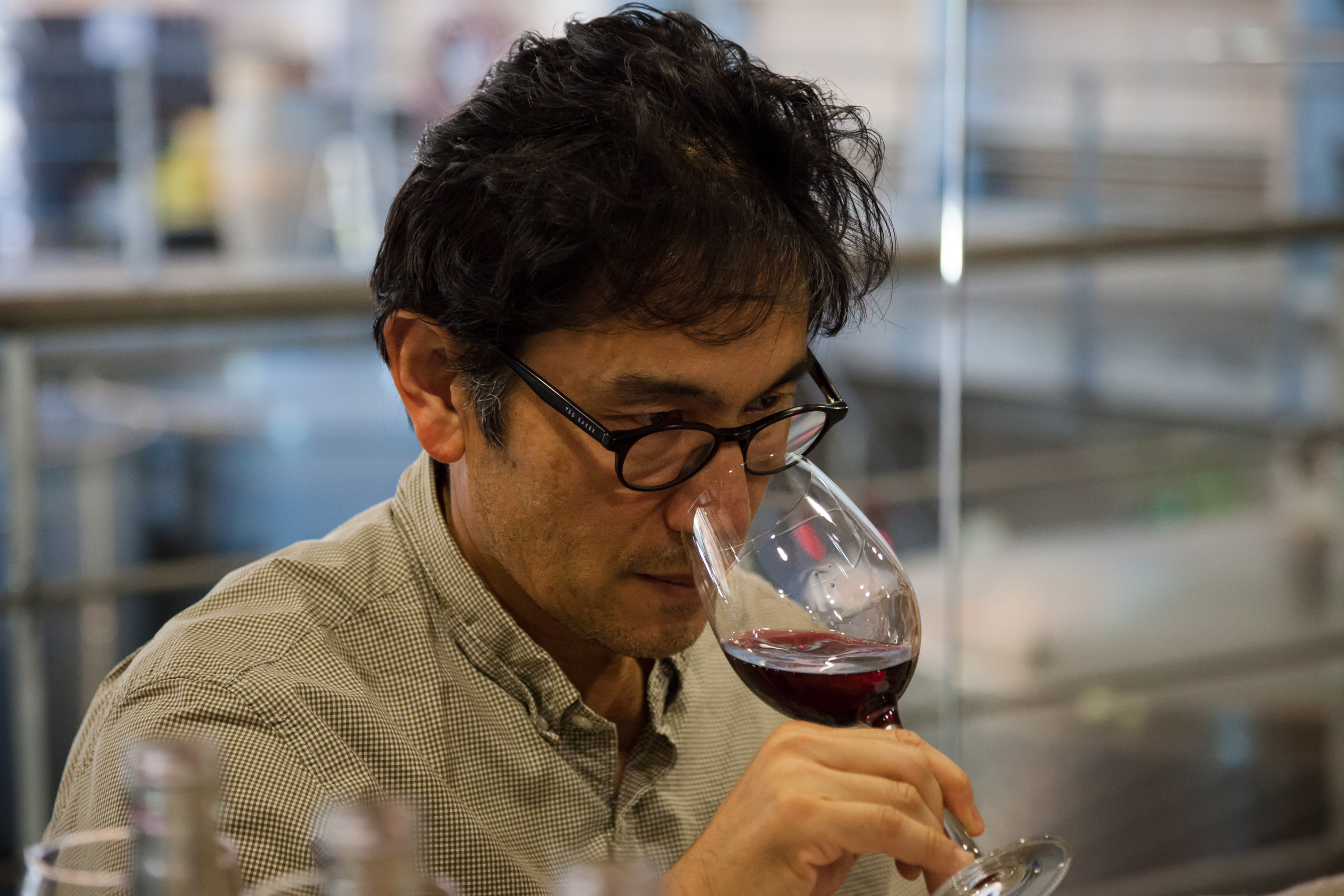 Byron searches for inner peace in the glass. Actually, he’s tasting our Pinot Noir to decide the final blend for Alazan.