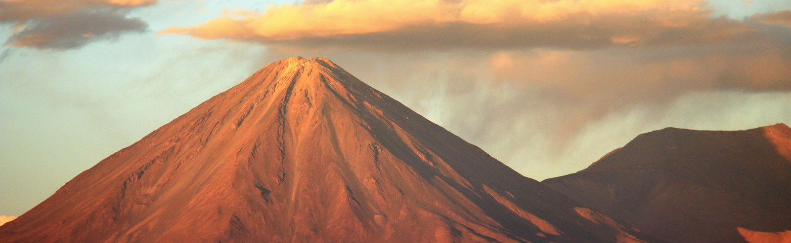 Volcán Licancabur towers over the Atacama Desert. Photo credit Krheesy, Flickr.