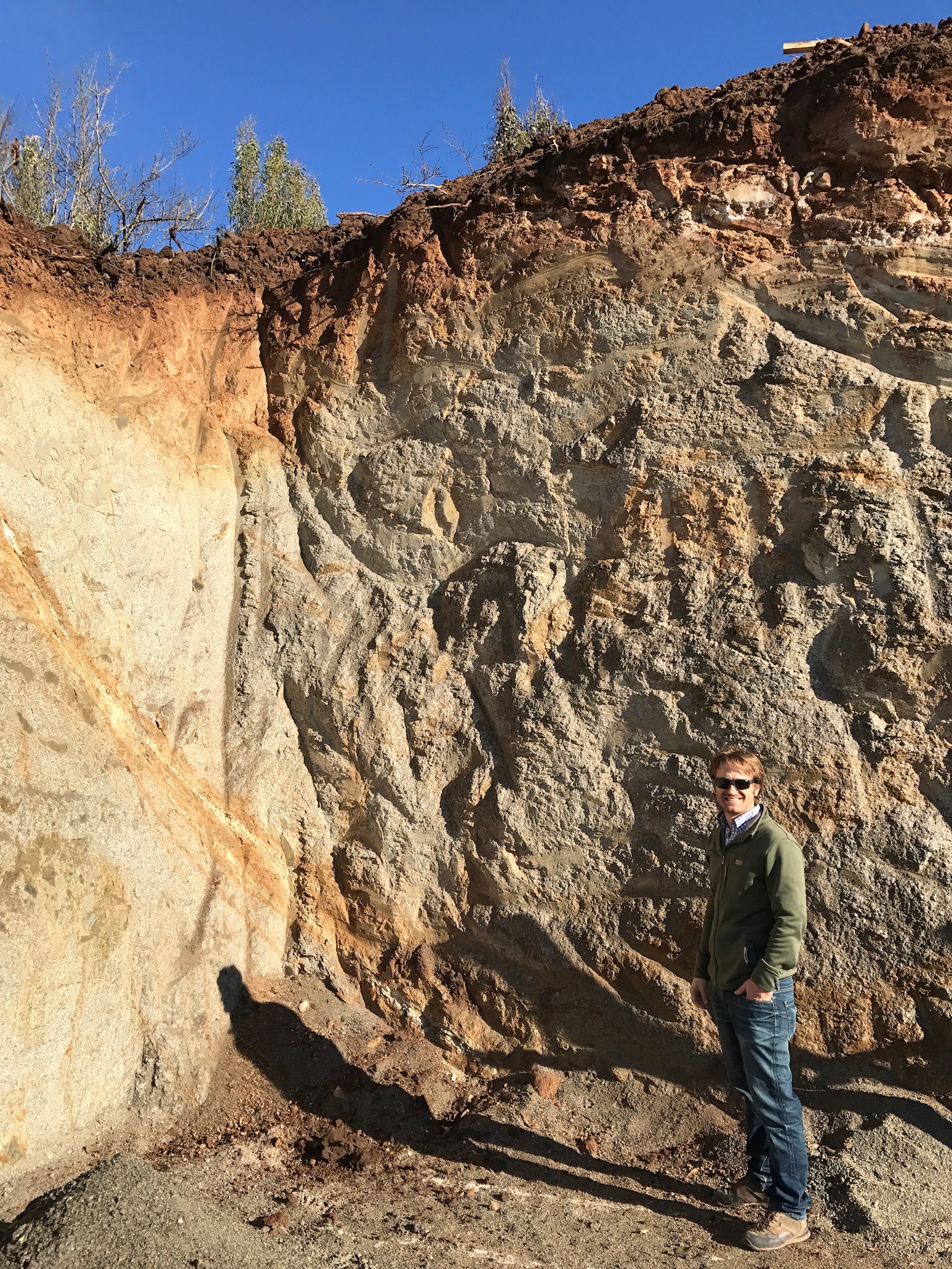 Our winemaker, Amael, at the construction giddy that he's able to see our soil profile up close.