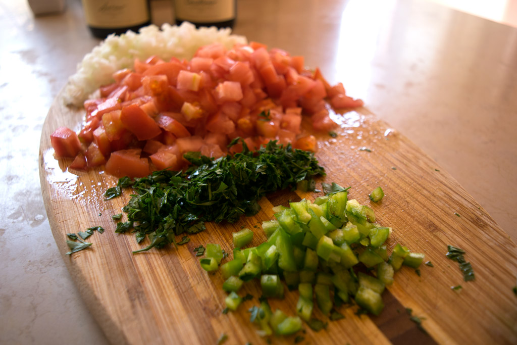 Onion, tomato, parsley and green pepper for CJ Kingston's chicken recipe