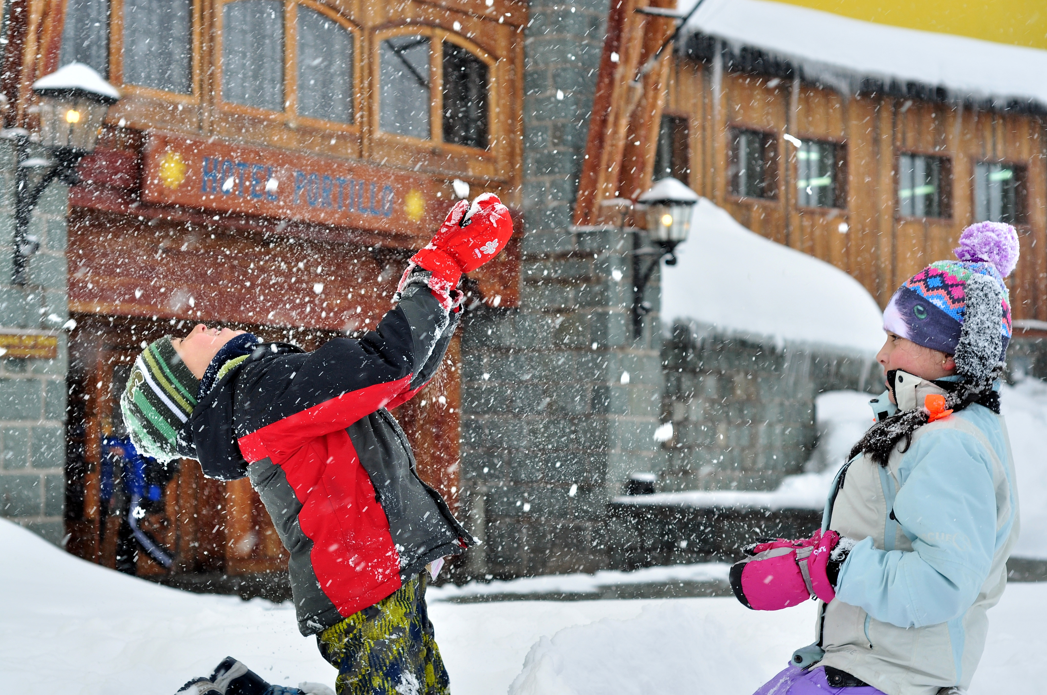 Kids play in the snow outside of the Hotel Portillo. Photo courtesy of Ski Portillo.
