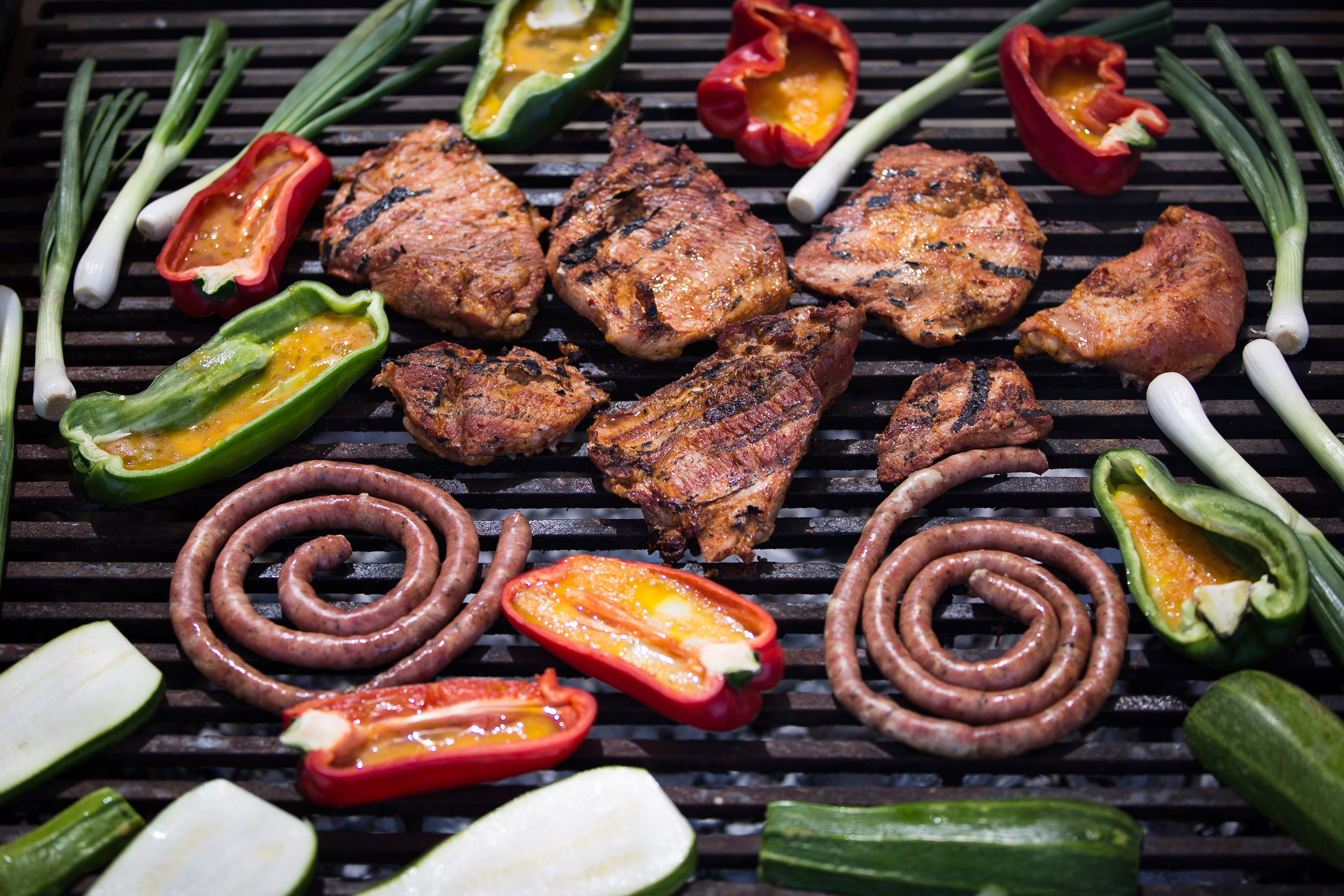 Meat and vegetables on the grill snapped by Nils Kingston during an asado at the winery.