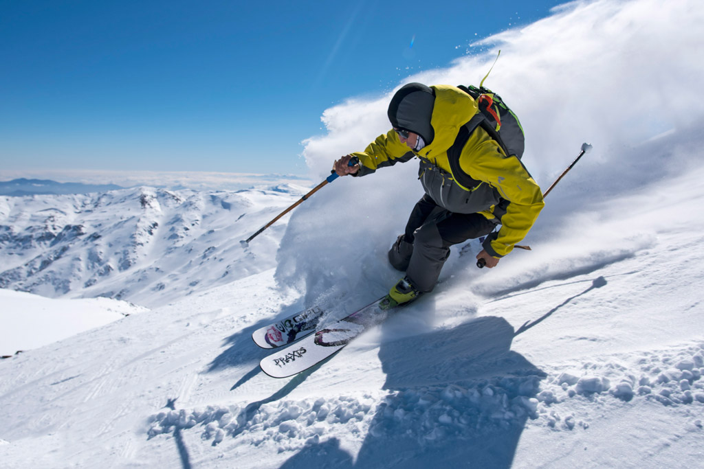 A skier makes a turn on top of the world at Ski Arpa. Photo by Michael Neumann, courtesy of Upscape Travel.