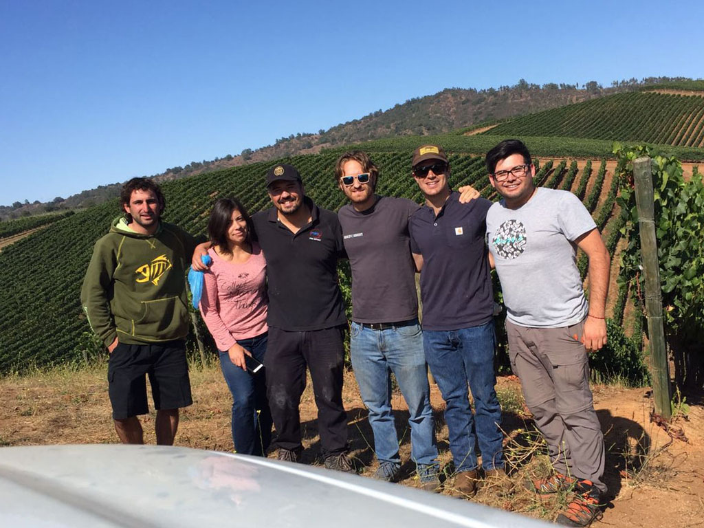 Winemaker Amael Orrego and the Kington Family Vineyards team in the vineyards